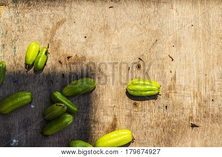 Bilimbi fruits on wooden table background, Oxalidaceae.