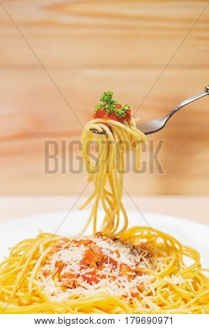 Close-up Of Asta Spaghetti With Tomato Sauce, Olives And Garnish. Italian Food.
