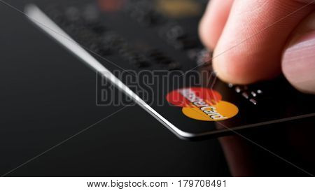 Estonia, Tallinn, March 23, 2017. Plastic card Mastercard. Selective focus