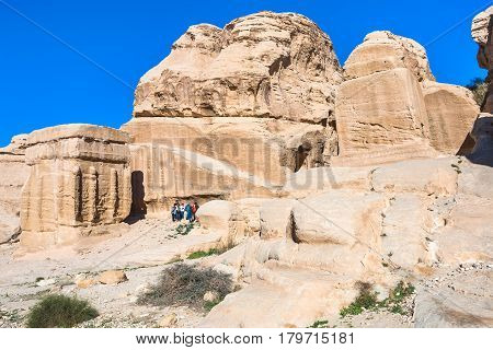 Tourists Near Djinn Blocks In Bab As-siq Of Petra