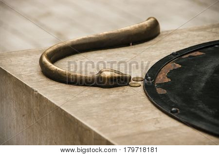 Monument temptation - a snake and money