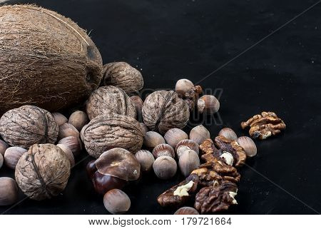 Assorted Nuts On A Black Background