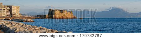 Castel dell Ovo at sunset in the bay of Naples italy