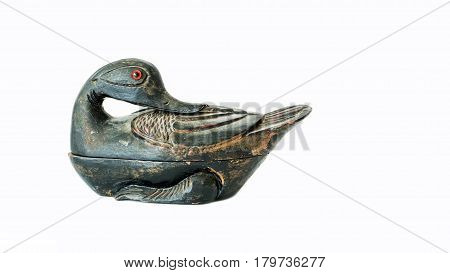 Old wooden crafted duck isolated on white background