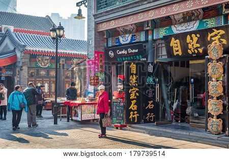 Tianjin, China - Nov 1, 2016: Tianjin Ancient Cultural Street, preserved in the classical Qing Dynasty architectural style. Morning scene to what is a very popular tourist area.