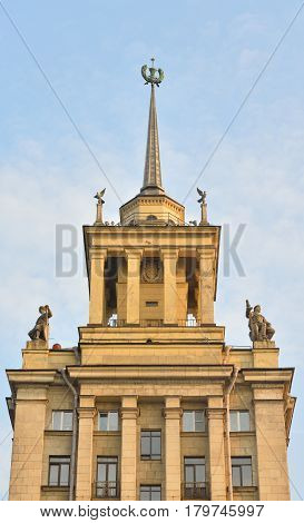 High-rise building in the neoclassical style on Moskovsky Avenue in Saint Petersburg at sunny summer evening.