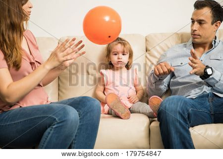 Parents Trying To Stop Their Daughter From Crying