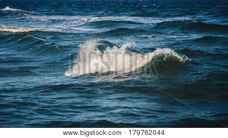 Close-up of a beautiful wave. Wave splash details abstract background
