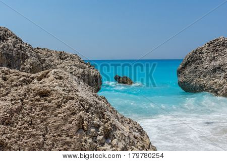 Amazing landscape of blue waters of Megali Petra Beach, Lefkada, Ionian Islands, Greece