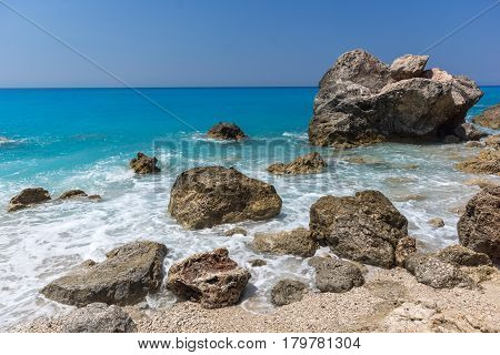 Amazing landscape of blue waters of Megali Petra Beach, Lefkada, Ionian Islands, Greece