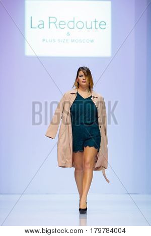 MOSCOW RUSSIA - MARCH 22 2017: Model walk runway for LA REDOUTE & PLUS SIZE MOSCOW catwalk at Autumn-Winter 2017-2018 Moscow Fashion Week. Plus-size fashion models.