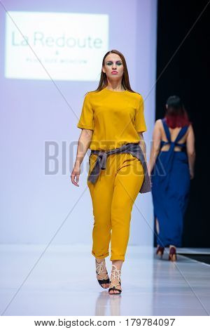 MOSCOW RUSSIA - MARCH 22 2017: Model walk runway for LA REDOUTE & PLUS SIZE MOSCOW catwalk at Autumn-Winter 2017-2018 Moscow Fashion Week. Plus-size fashion models.