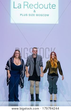 MOSCOW RUSSIA - MARCH 22 2017: Model walk runway for LA REDOUTE & PLUS SIZE MOSCOW catwalk at Autumn-Winter 2017-2018 Moscow Fashion Week. Plus-size fashion models.