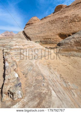 Rocks With Water Collecting Channel In Wadi Rum