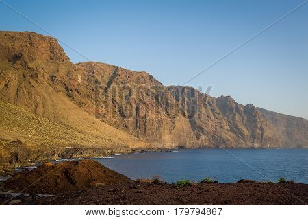 Sunset view from Punta de Tena to famous Los Gigantes rocks. Tenerife island, Canarias, Spain.