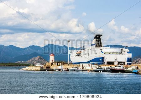 coastline with mountain view ferry port big harbor on sardegna island in italy