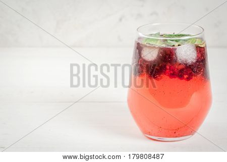 Gin Tonic With Mint Leaves And Blackberries
