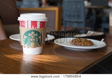 LAMPANG THAILAND JAN 02 2017: A tall Starbucks coffee in starbucks offee shop. Starbucks is the world's largest coffee house with over 20000 stores in 61 countries.