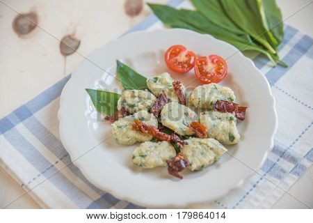 home made wild garlic gnocchi with bacon and cheese