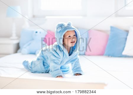 Baby In Bathrobe Or Towel After Bath