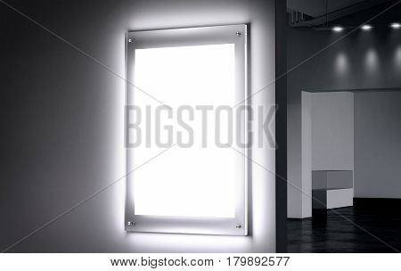 Blank white illuminated poster mock up in dark hall 3d rendering. Clear glowing affiche design mockup mounted on gallery wall. Led acrylic billboard with empty placard in cinema room. Light box sign