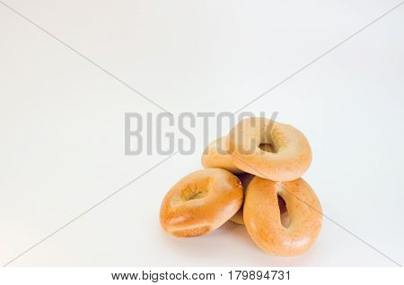Fresh bagel isolated on white background top view