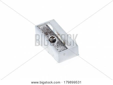 Old Used White Plastic Pencil Sharpener Isolated On White.