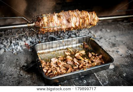 Making Home Made Cag Kebab Gyros With Fire And Charcoal.