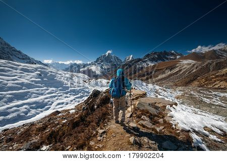 Trekker in Khumbu valley on a way to Everest Base camp