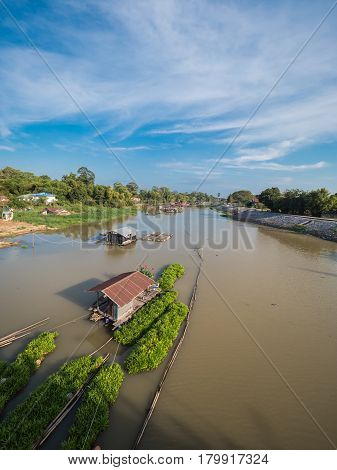 Traditional houseboat on natural river in Uthaithani Thailand
