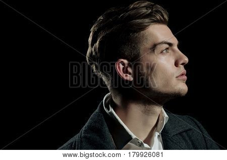 Handsome Man With Stylish Blond Hair Posing With Serious Face