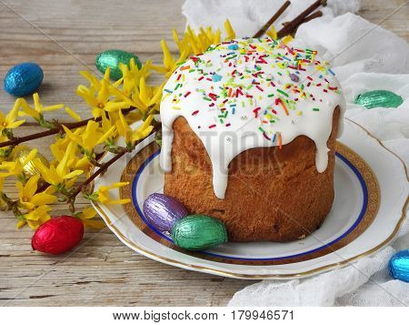Easter Composition Of Sweet Bread, Paska And Eggs On Wooden Background. Orthodox Kulich. Holidays Br