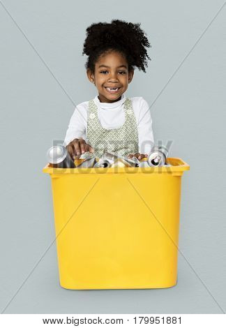 African Descent Girl holding Plastic Container