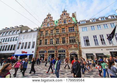 COPENHAGEN DENMARK - JUNE 15: Stroget - this popular tourist attraction in the center of town is the longest pedestrian shopping area in Europe in Copenhagen Denmark in 2012