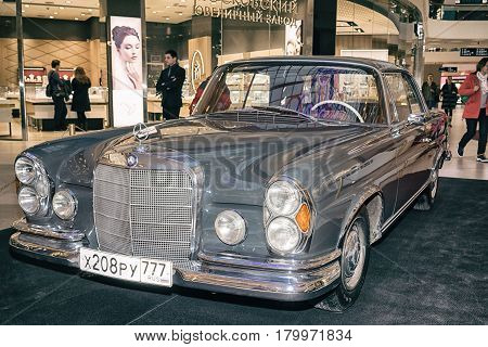 Moscow Russia - April 02 2017: Mercedes-Benz W111 280SE Coupe Germany 1970. Retro car exibition in shopping mall Metropolis.