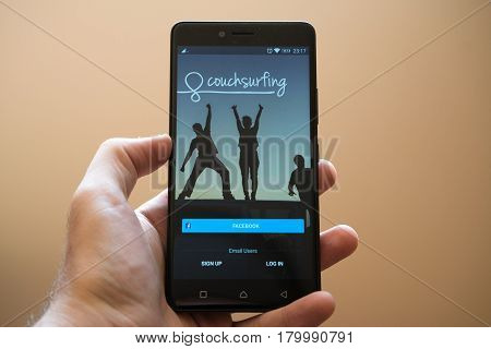 Nitra, Slovakia, March 24, 2017: Couchsurfing application logo on smartphone