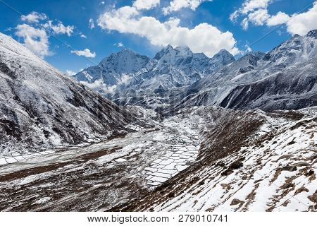 Himalaya Mountains Valley In Snow. Sagarmatha National Park, Himalaya Mountains, Nepal. Beautiful La
