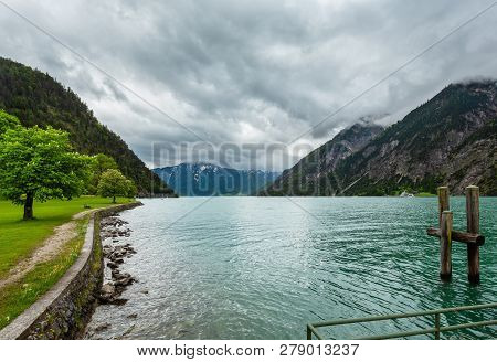 Achensee ( Lake Achen) Summer Landscape With  Green Meadow And Wooden Moorage (austria).