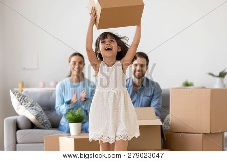 Happy Kid Girl Holding Box Having Fun Enjoying Moving Day