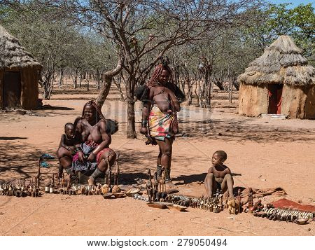 Namibia, Kamanjab, December 4, 2018, Himba Tribe Woman With Child, In The Village Of Himba People Th