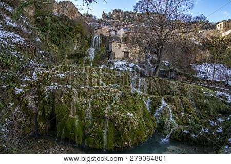 Waterfall In  The Village Of Orbaneja Del Castillo In The Province Of Burgos