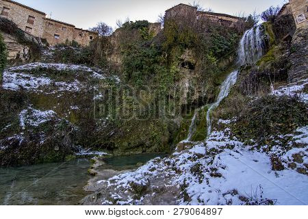 Waterfall In  The Village Of Orbaneja Del Castillo In The Province Of Burgos
