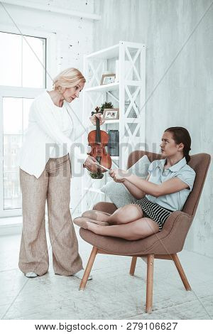 Sad Unhappy Woman Taking Away Girls Smartphone