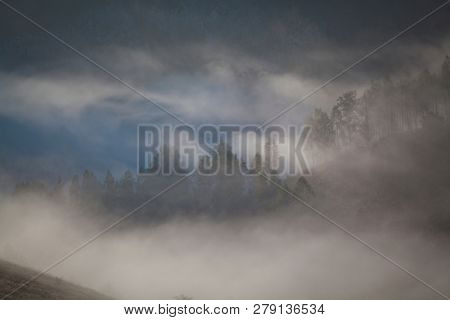 foggy summer landscape in the mountains, Salciua, Romania
