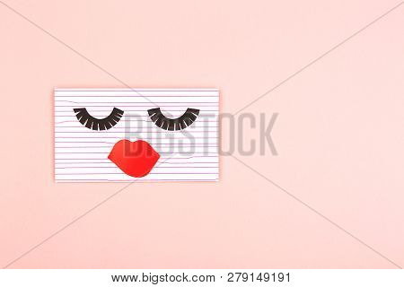 Creative Love Or Valentines Day Background Made With Cute Envelope. Eye Lashes And Red Lips Looklike