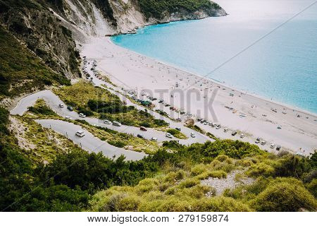 Serpentine Road Lead To Famous Myrtos Beach. Most Visited Place On Kefalonia During Cruise Travel Tr