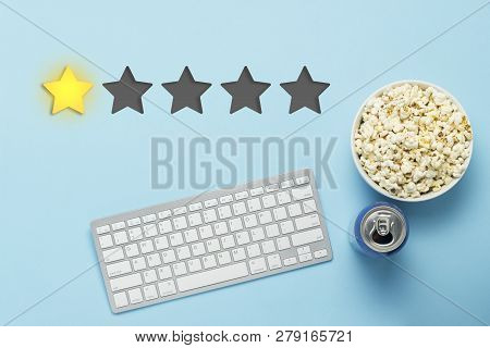 Bowl Of Popcorn, A Can Of Drink, A Keyboard On A Blue Background. Added One Star Rating. Reputation.