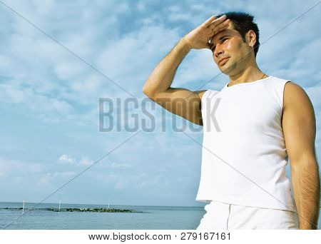 Young Brunette Man On Beach At Sea Smiling, Gomosexual In White