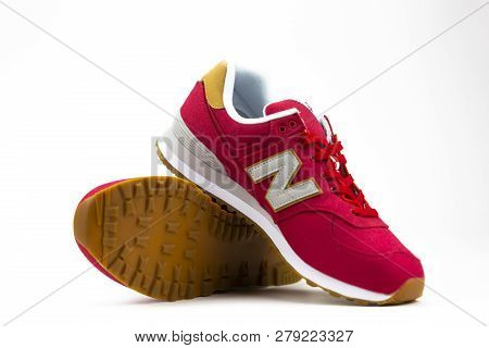 Boston, Ma, Usa, January 2019 - New Balance Nb 574 Athletic Shoes On Studio Background. New Balance 