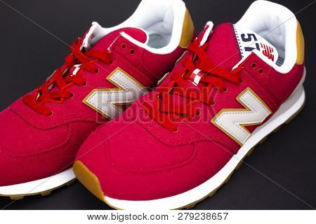 Boston, Ma, Usa, January 2019 - New Balance Nb 574 Athletic Shoes On Studio Background. New Balance 